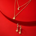 set-de-aretes-y-collar-dorado-con-dijes-de-estrellas